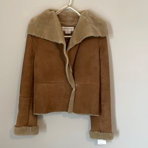 Jones New York, leather/shearling coat, size M. It is brand new with tags.